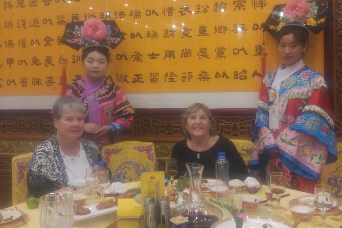 Beijing Imperial Dining Experience at Bai Jia Da Yuan Restaurant with Houhai Lake Bar Tour - Night-Drive Route: Illuminated Bird’s Nest and Water Cube