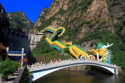 Private Day Tour to Longqing Gorge with Boat Ride and Cable Car from Beijing - Longqing Gorge at the Dam: The Artificial Dragon Elevator