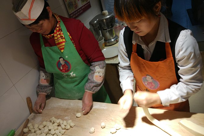 Private Hutong Culture Tour with Dumpling Cooking Class plus Cricket Fighting Game - Drum Tower Views and the Yandaixiejie Hutong Walk to Houhai