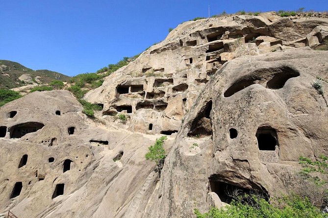 Private Longqing Gorge & Guyaju Cave Day Tour w/ Cruise Ride - Guyaju Cave Dwellings: Cliff Rooms Carved for Everyday Life