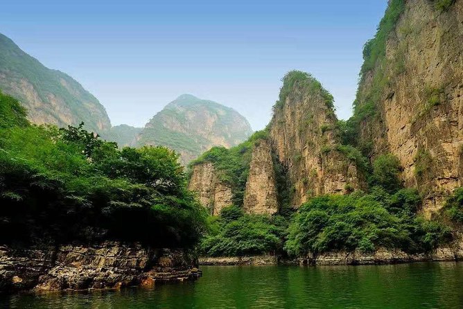 Private Transfer to Longqing Gorge and Guyaju Caves Excursion by English Driver - Guyaju Caves: 117 cliff rooms and a maze reputation